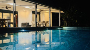 VILLA Ô 3 CAP - Magnifique Villa avec piscine CHAUFFEE - 4 ch - 8 personnes - accès direct à la plage et à l'esplanade de BOUCAN CANOT